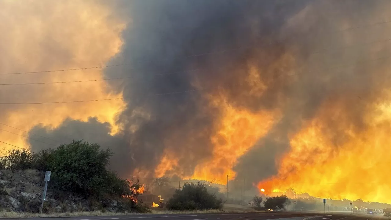 Wildfire claims 6 homes near Arizona town, shuts Phoenix-to-Las Vegas highway