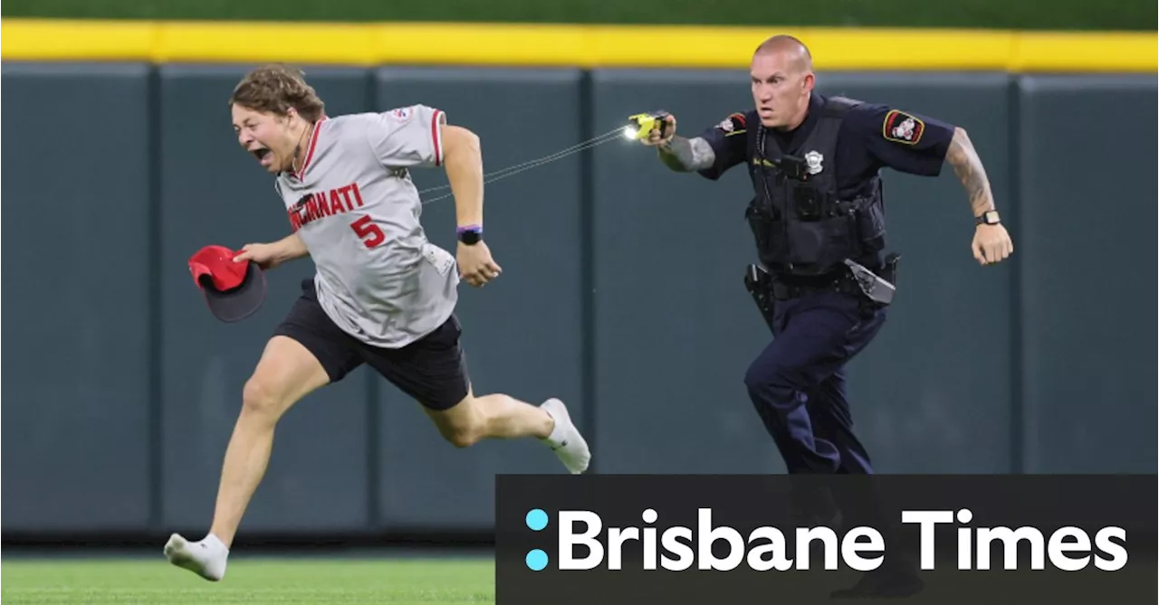 Pitch-invading fan Tasered by police after performing backflip