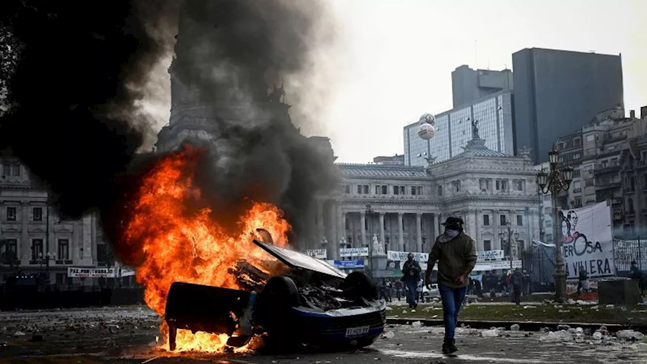 Protesters and police clash in Argentina as Congress debates Milei’s reform bill