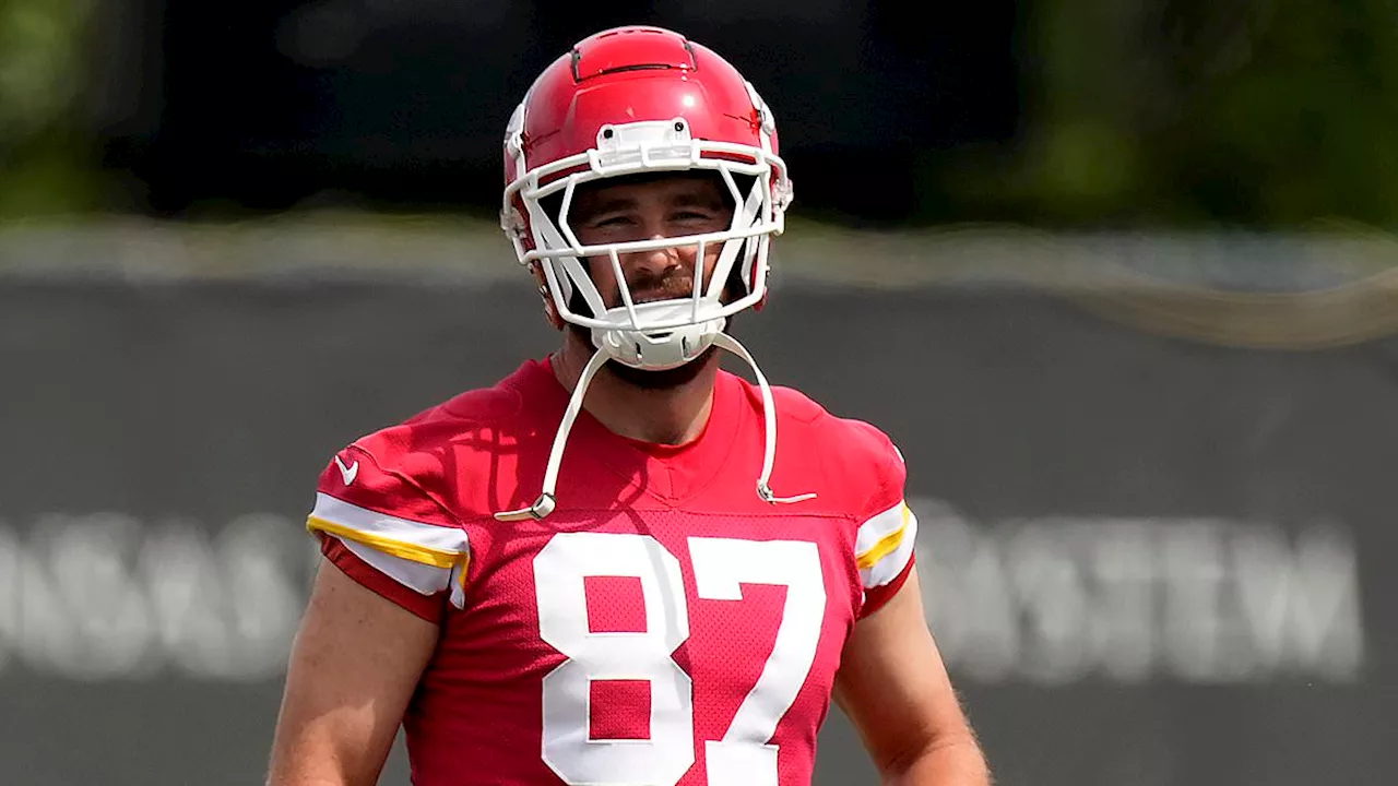 Travis Kelce gets stuck into training while his girlfriend Taylor Swift hits London with her new...