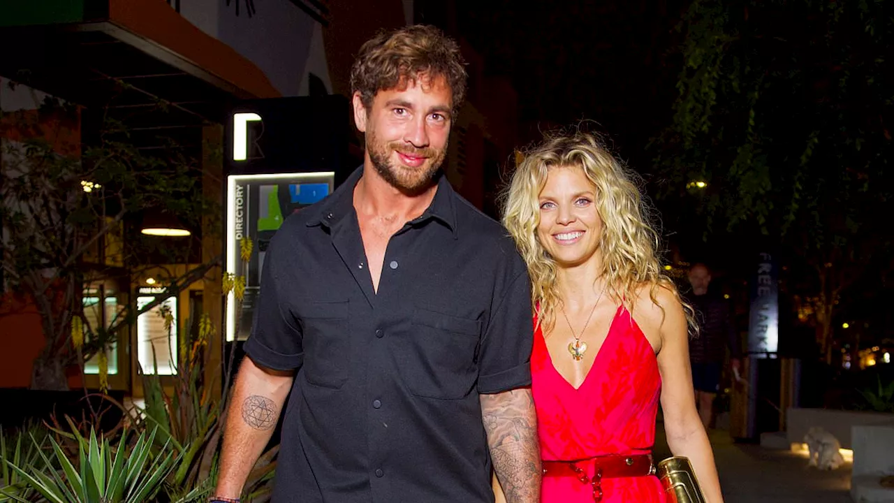 Danny Cipriani puts on a loved-up display with glamorous girlfriend AnnaLynne McCord as they enjoy...