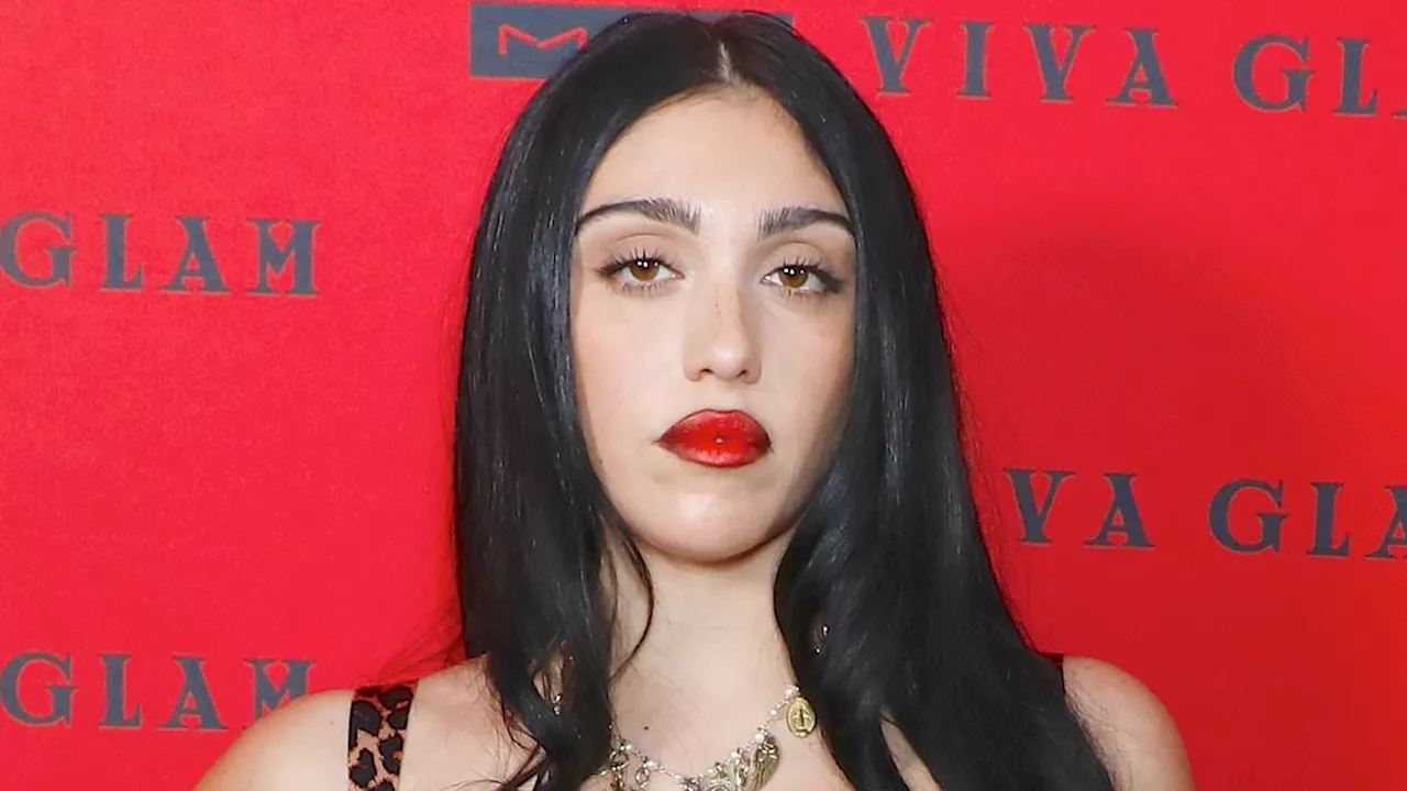 Lourdes Leon, 27, smolders in a busty leopard print dress and red lipstick as she leads stars at the...