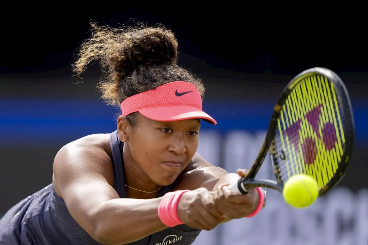 Osaka advances in Wimbledon warm-up