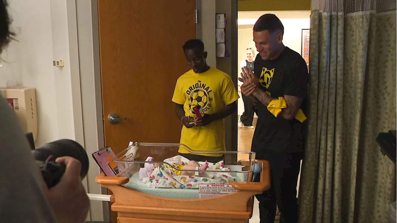 Crew players deliver a big surprise to growing families at Riverside Methodist Hospital