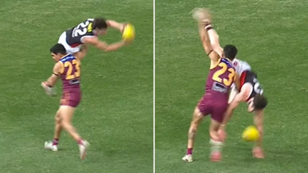 AFL youngster Darcy Wilson escapes injury in scary tackle with Charlie Cameron