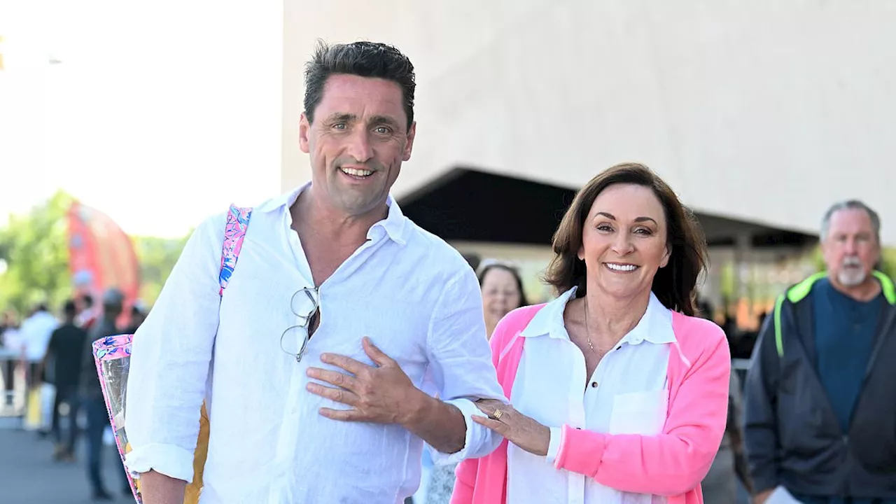 Strictly's Shirley Ballas, 63, cosies up to her toyboy fiancé Danny Taylor, 50, as they head out in...