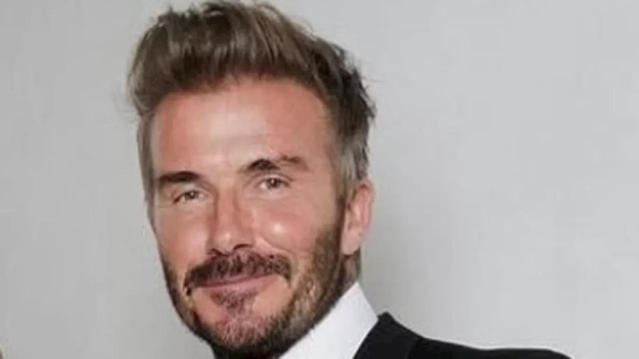 David Beckham insists the long-awaited Spice Girls reunion tour is 'unfortunately not happening' as...