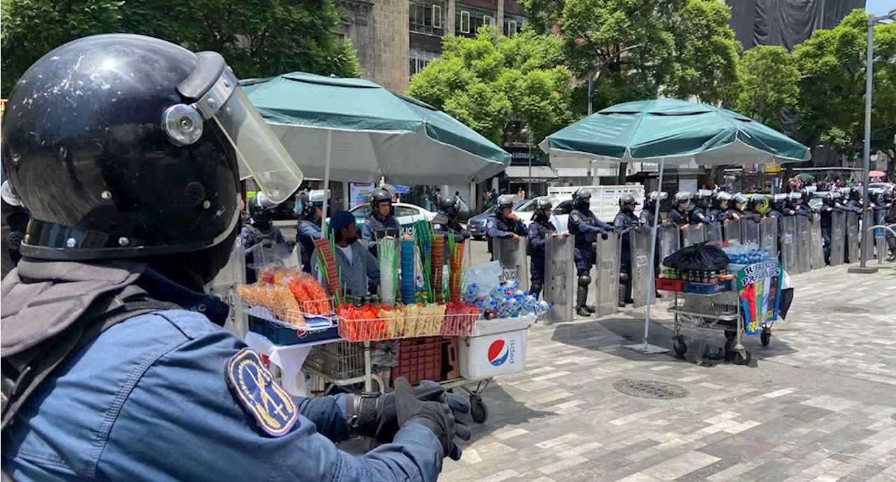 Encapsulan a comerciantes que pretendían manifestarse en Eje Central para exigir espacios en vía pública