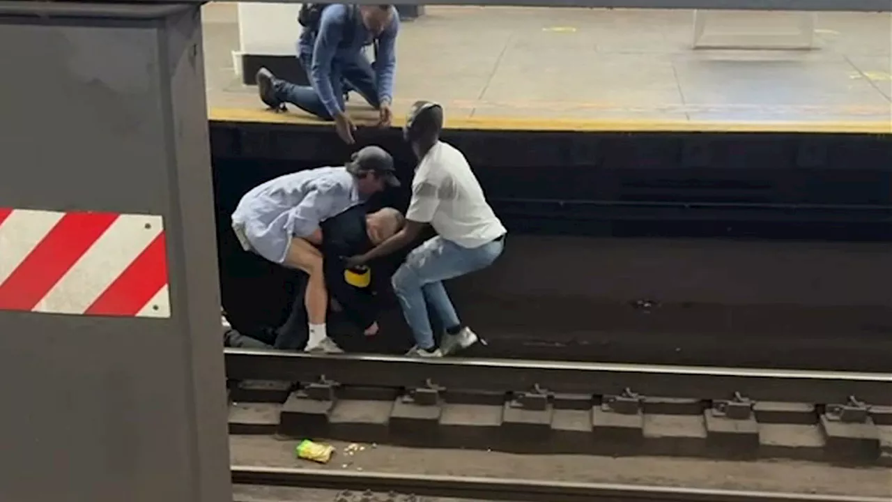 Video shows Good Samaritans rescue stranger who collapsed on Brooklyn subway tracks