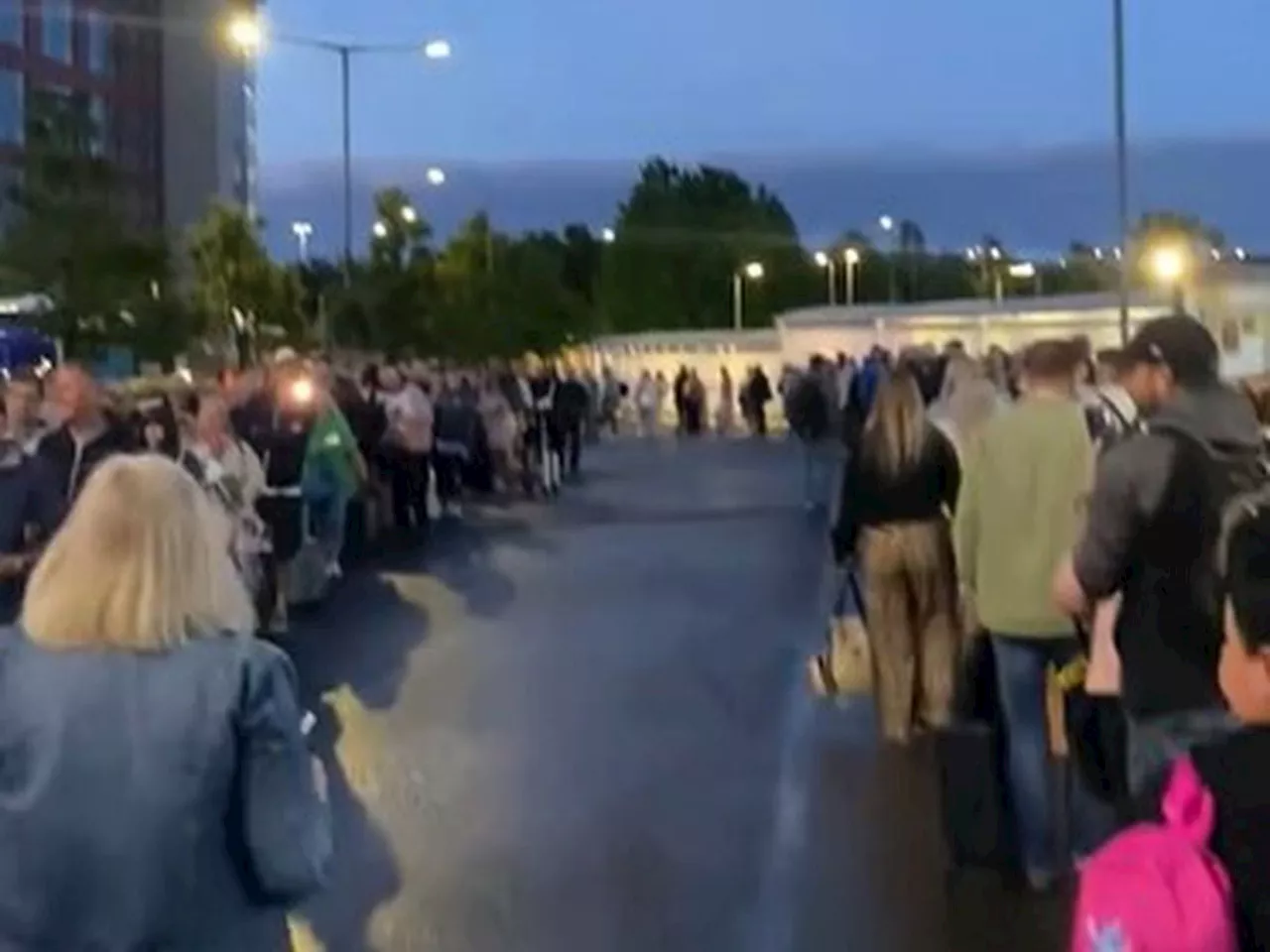 Watch: ‘Carnage’ outside Birmingham Airport as passengers hit out at huge queues outside