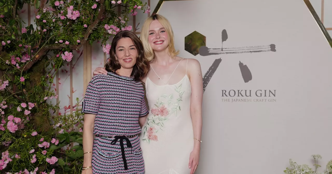 Elle Fanning Looks Angelic in a Vintage White Slip Dress While Reuniting With Sofia Coppola