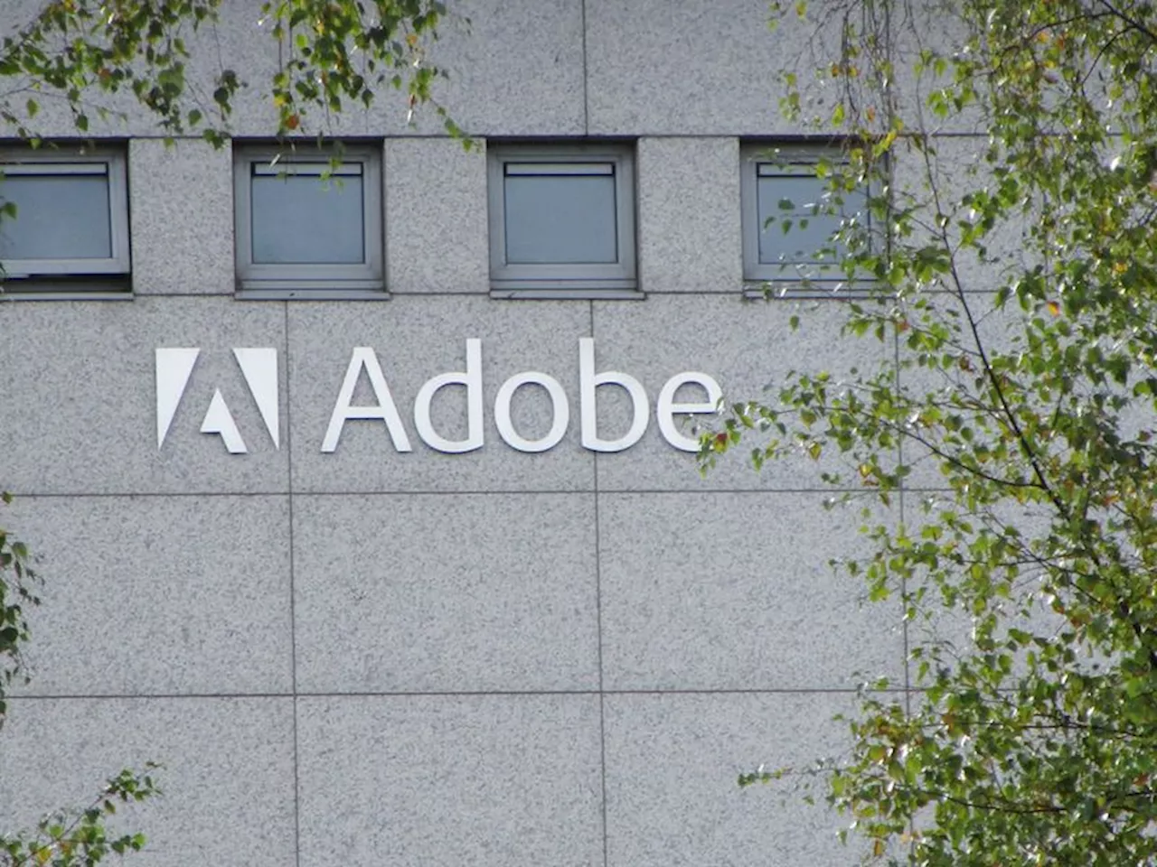 Adobe surges as AI optimism fuels annual revenue forecast