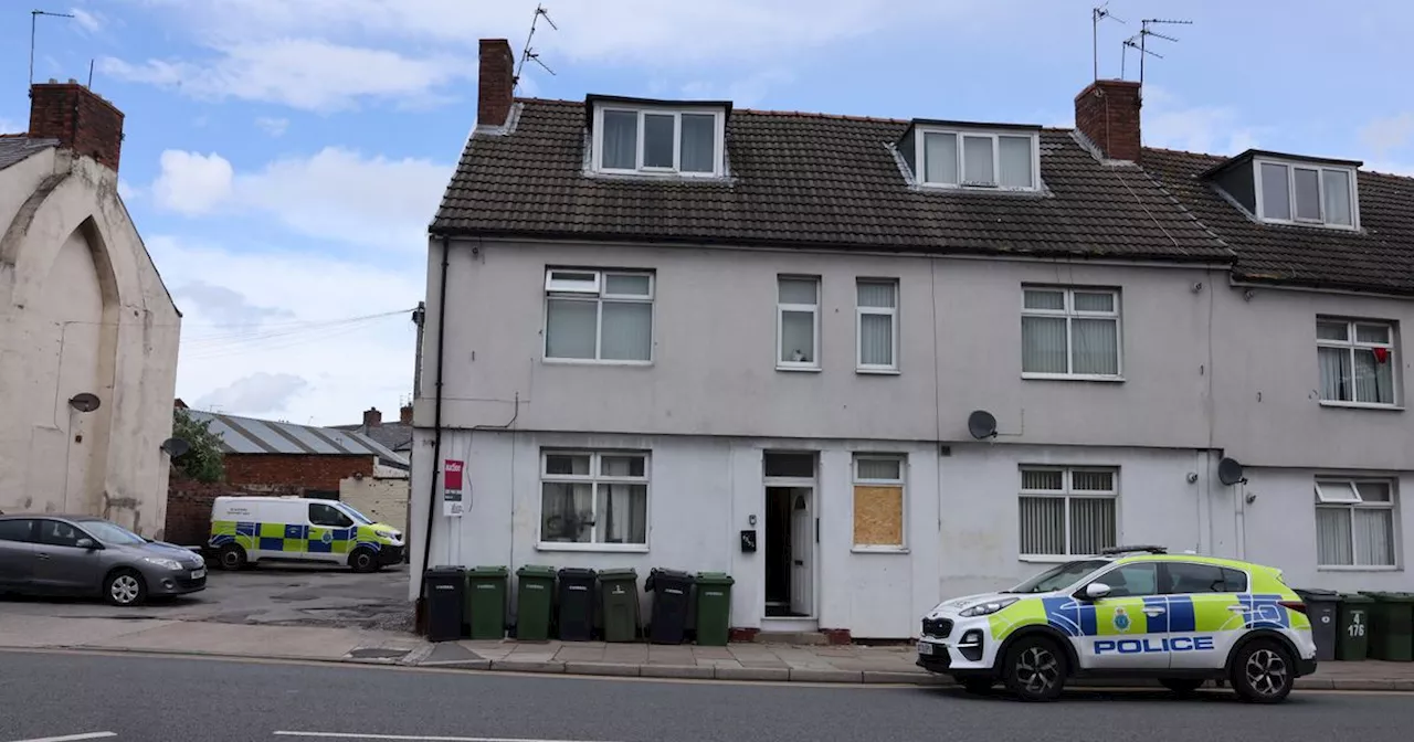 Man in his 40s found dead after police surround house