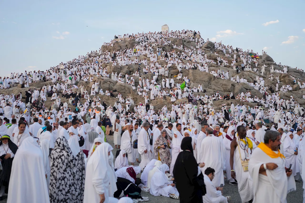 Muslim pilgrims converge at Mount Arafat for daylong worship as Hajj reaches its peak