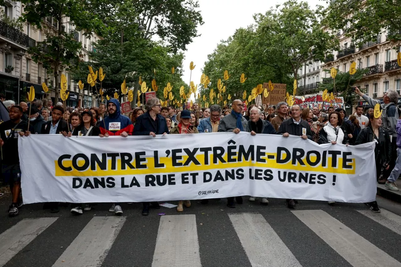 Thousands march in France in pre-election protest against far right