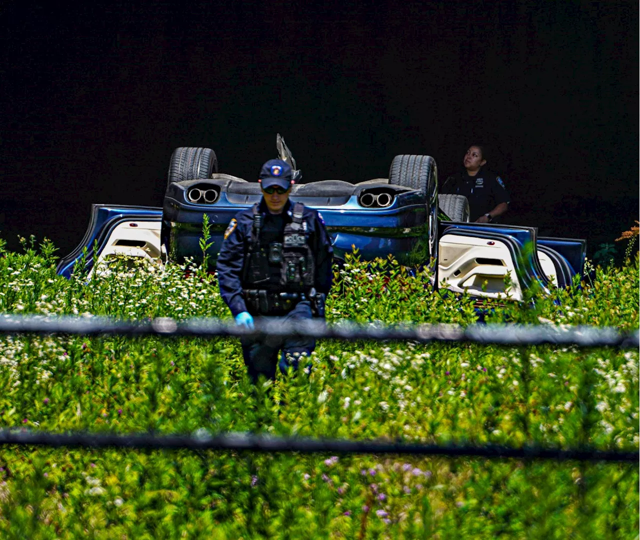 Driver in Bronx manages to flee after crashing his luxury car off a parking garage roof