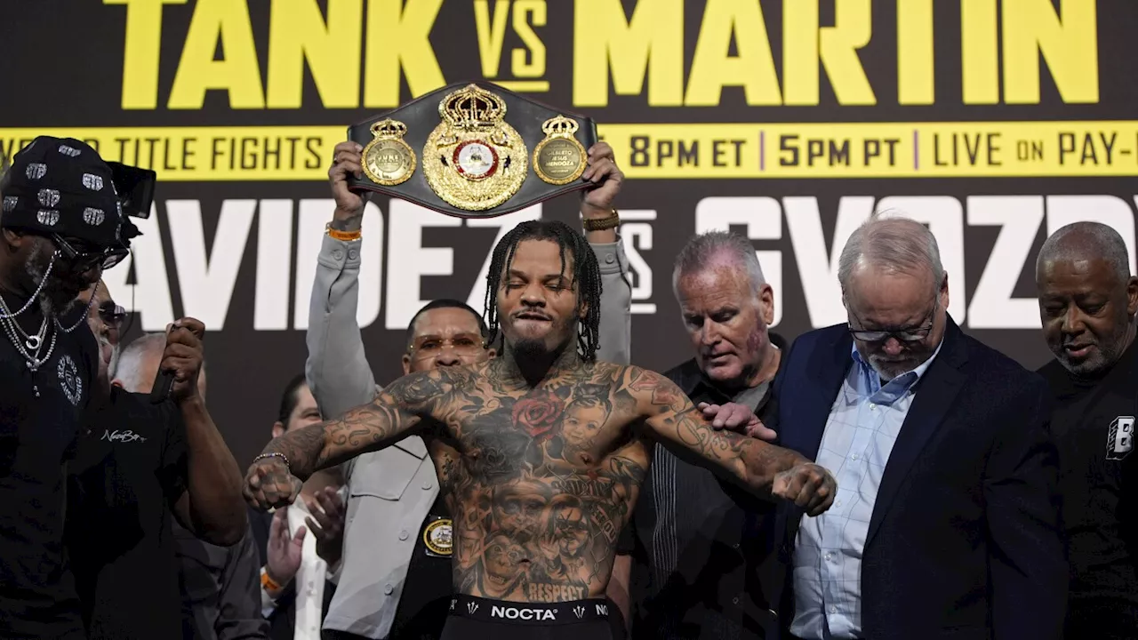 'Tank' Davis knocks out Martin in the 8th round to keep WBA lightweight title