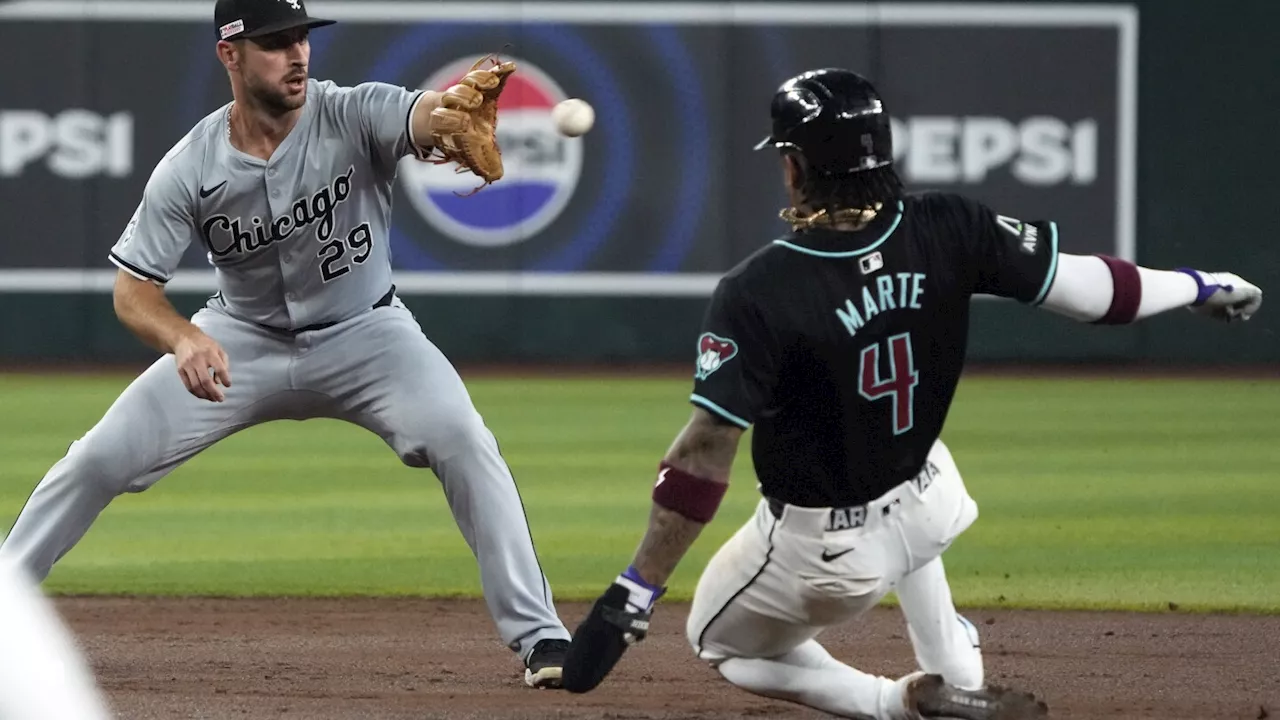 White Sox score tying run on apparent intentional balk, beat Diamondbacks 9-2 for rare road win