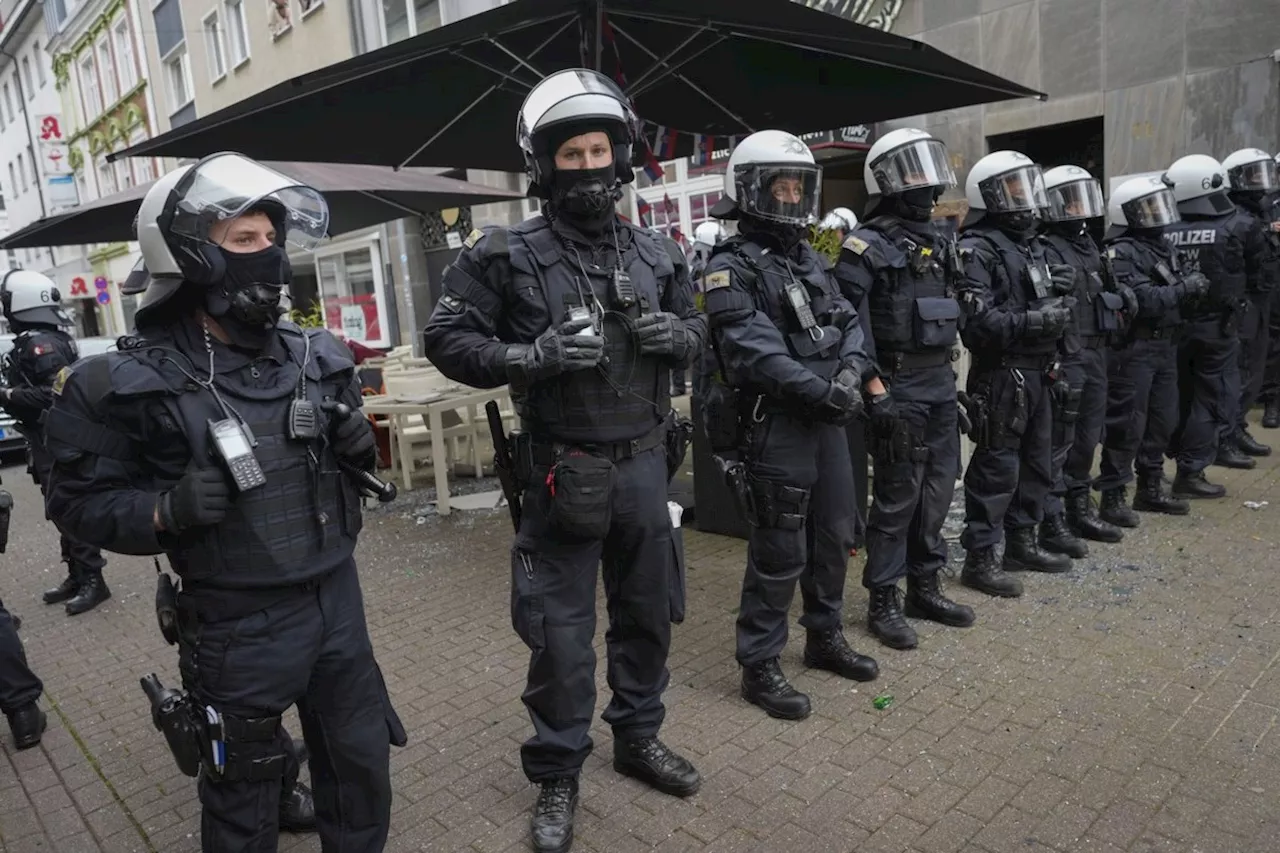 Riot police in Germany intervene to stem fan clashes before Serbia-England match at Euro 2024