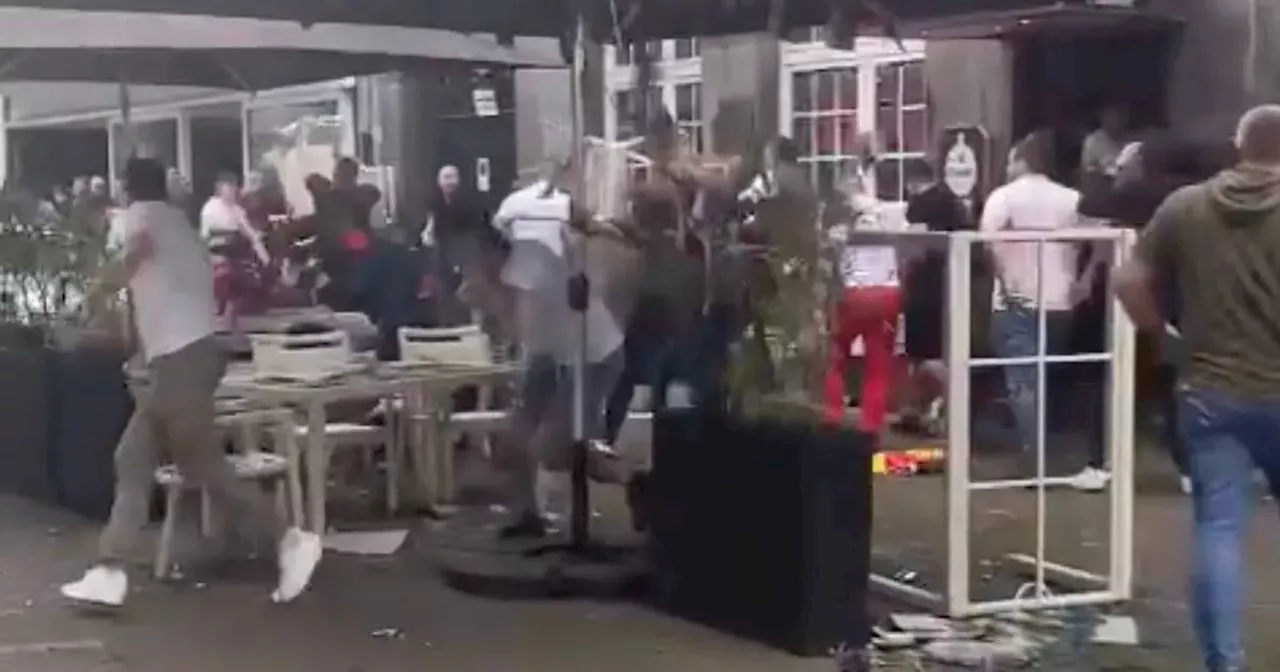 England and Serbia fans in violent mass brawl as chairs thrown and police act