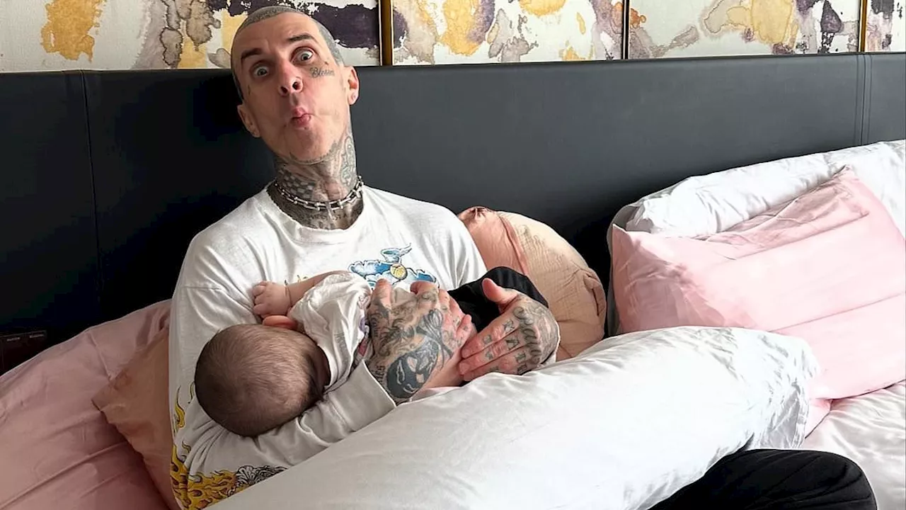 Kourtney Kardashian shares new snap of Travis Barker snuggling baby Rocky for gushing Father's Day...