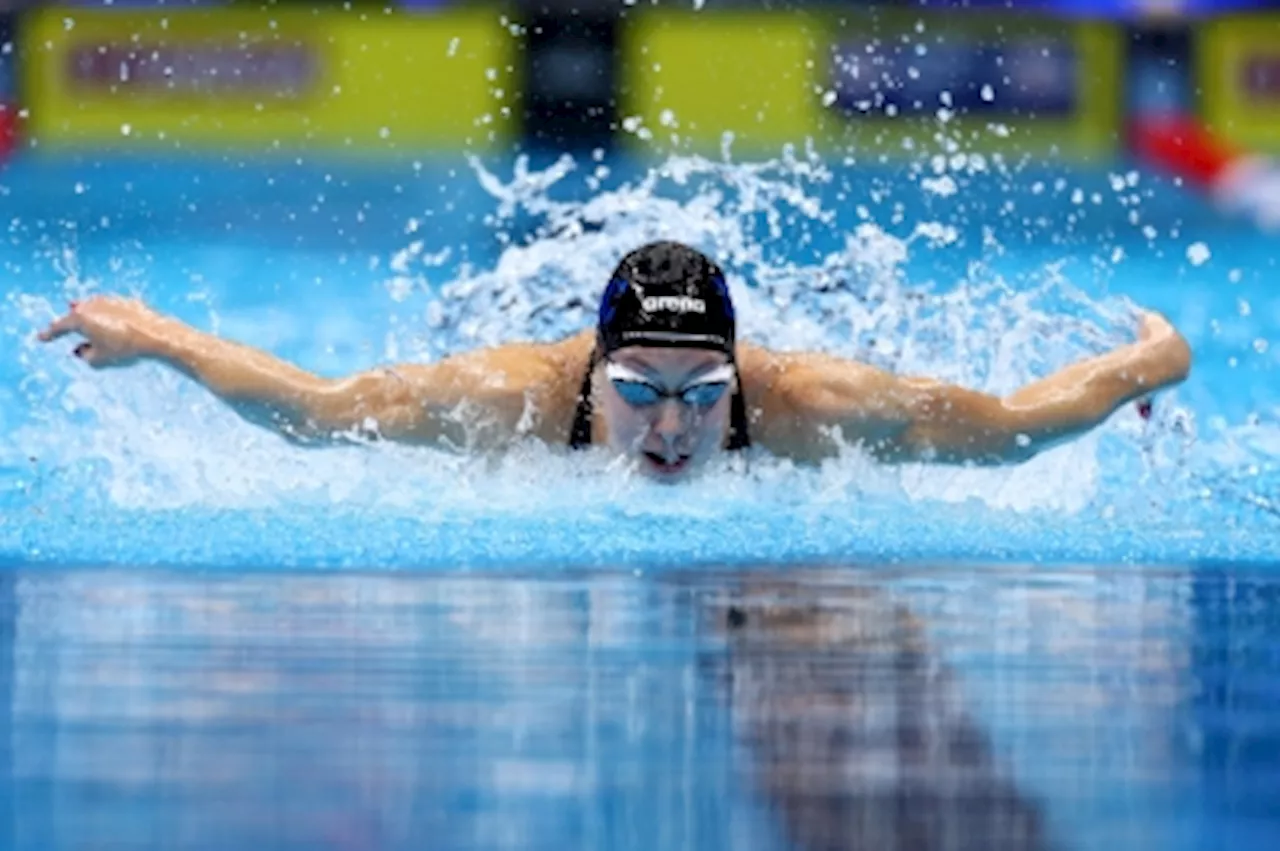 Gretchen Walsh sets 100m butterfly world record at US Olympic swimming trials