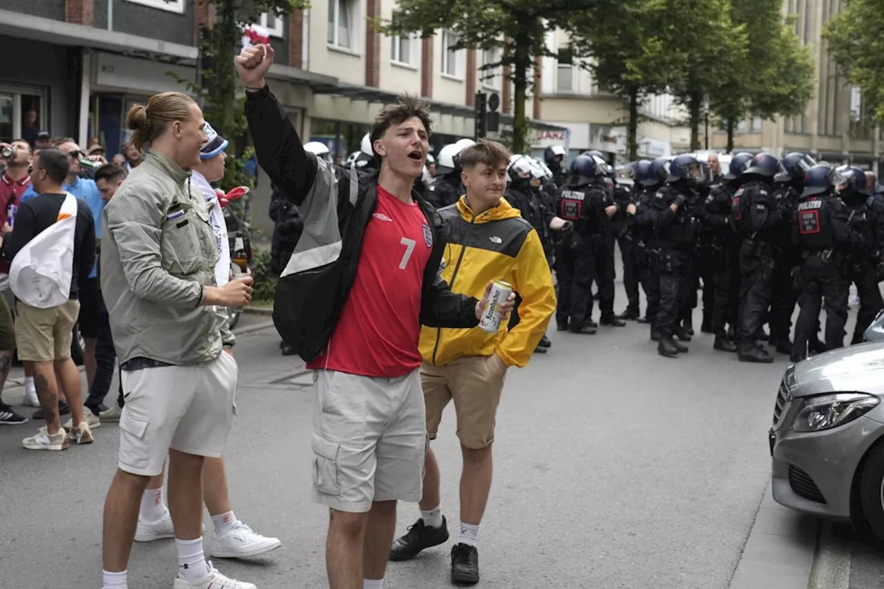 German police intervene to stem clashes between England and Serbia fans ahead of Euro 2024 match