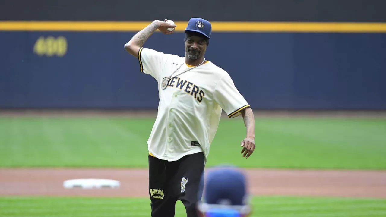 Look: Snoop Dogg Signs Ball for Cincinnati Reds Star Elly De La Cruz