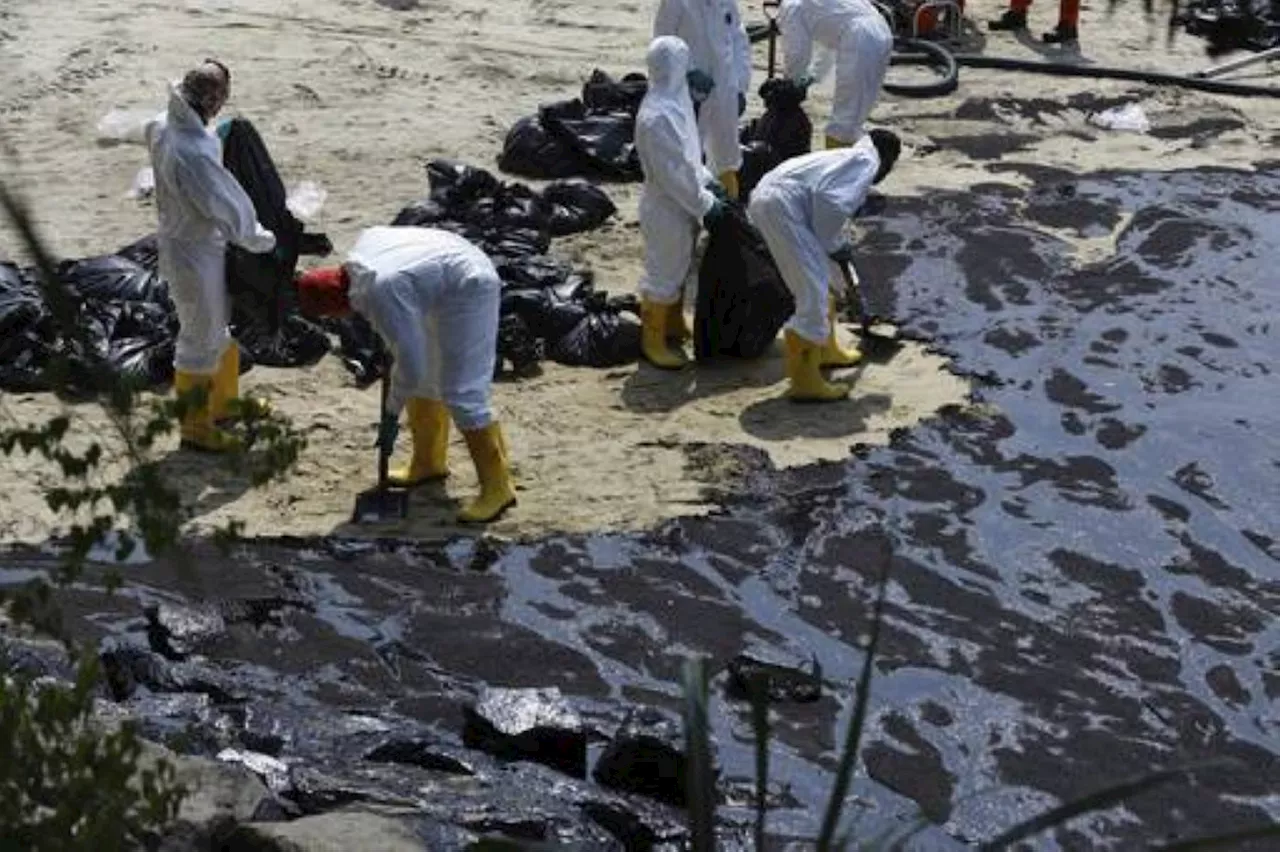 Cleanup ongoing after boat hits Singapore tanker