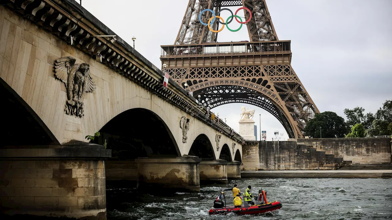 Boats cruise the Seine river in a rehearsal for the Paris Olympics’ opening ceremony