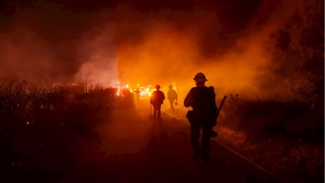 Southern California crews hampered by strong winds in first major wildfire of the year