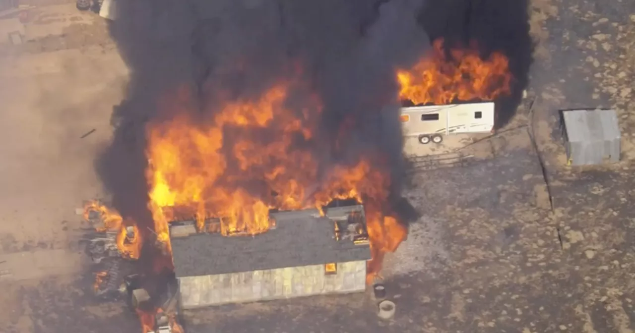 Fast-moving 500-acre brush fire damages buildings, poses threat to Lancaster housing community