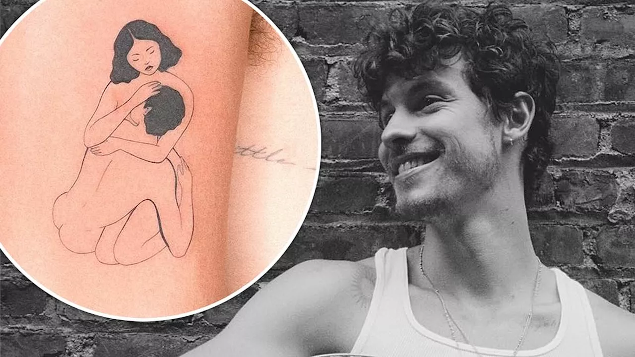 Shawn Mendes' racy new tattoo of a naked man cuddling a woman causes a stir among his fans: 'Who's...