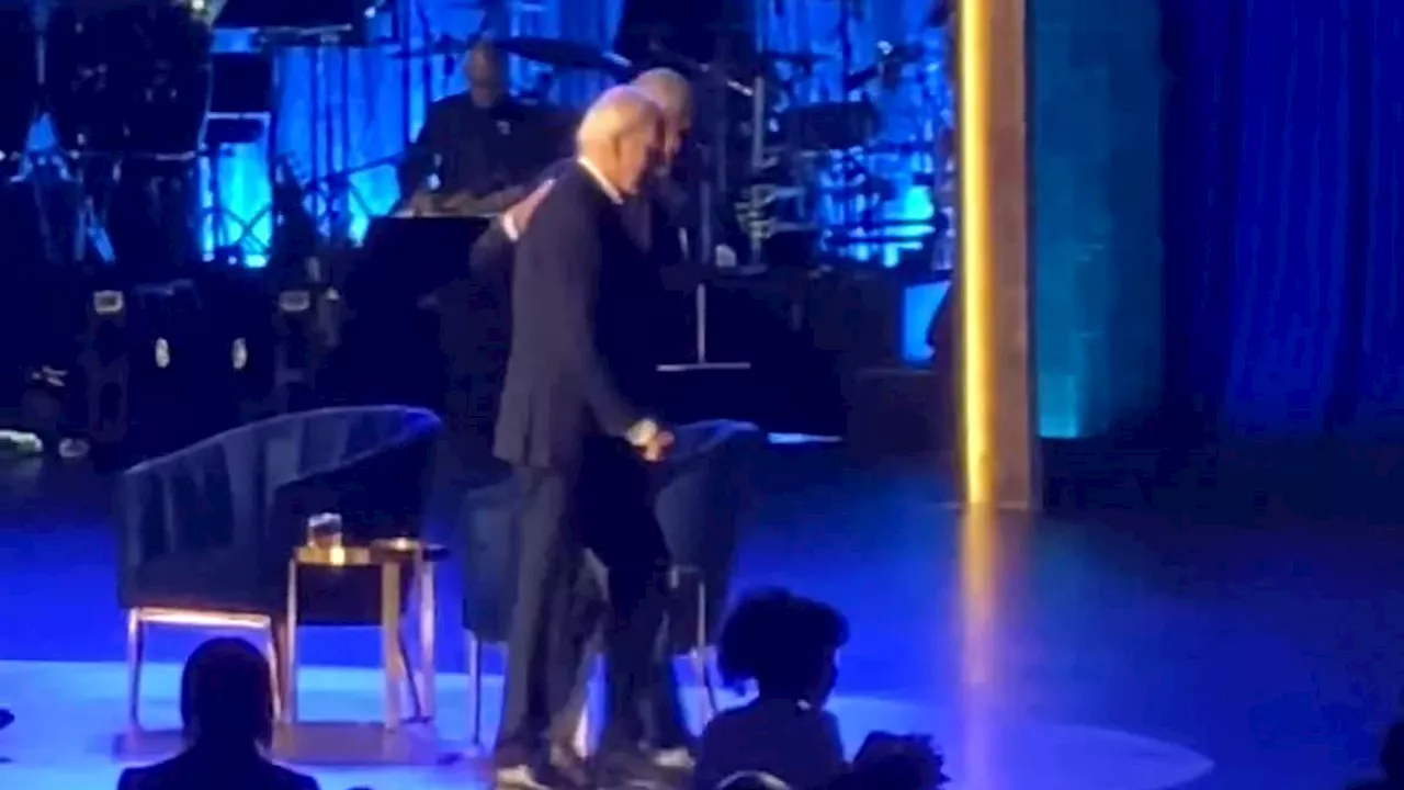 Biden FREEZES on stage at fundraiser before Obama comes to his rescue