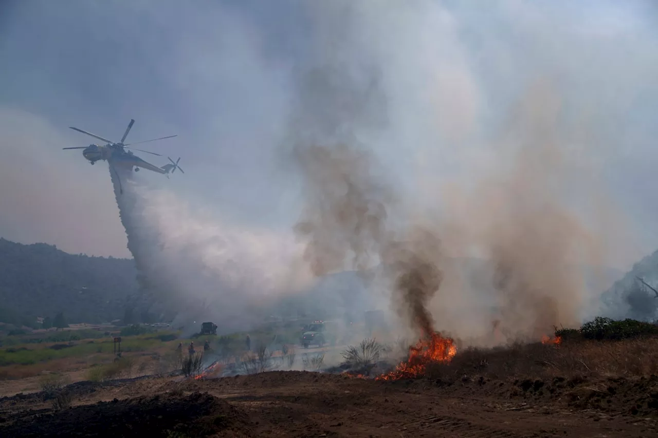 California wildfire burns 12,000 acres, forces evacuations