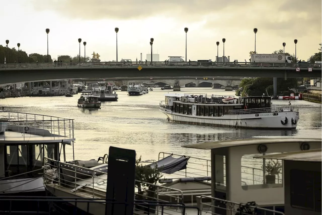 Dozens of boats cruise Seine river in rehearsal for Paris Olympics’ opening ceremony