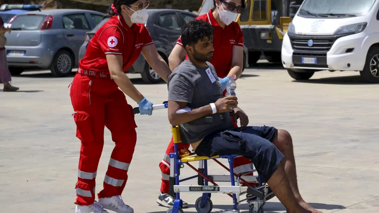 Eleven people killed and dozens missing after shipwrecks off Italy's south coast