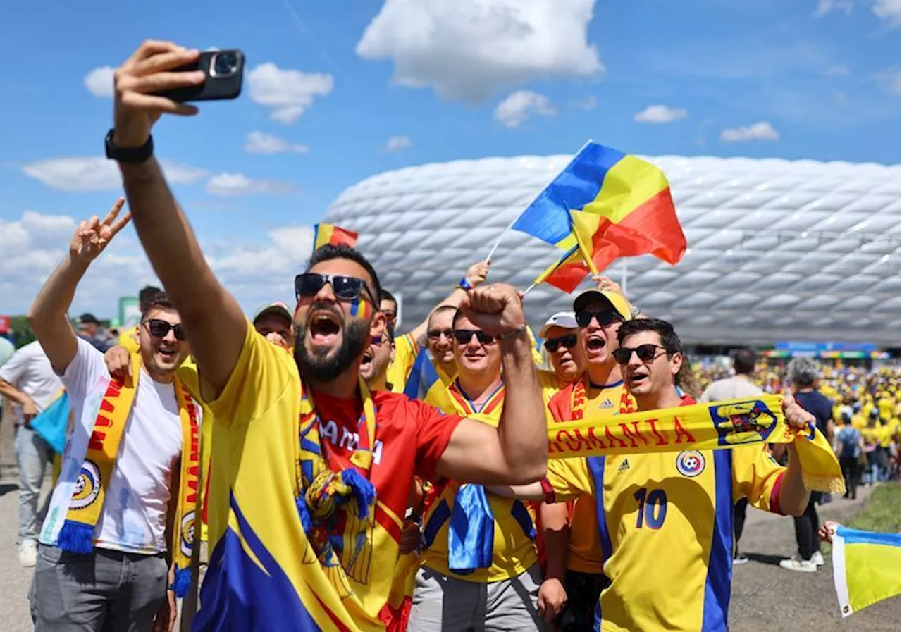 Soccer-Free sunscreen as fans dodge heavy rain at Euro 2024