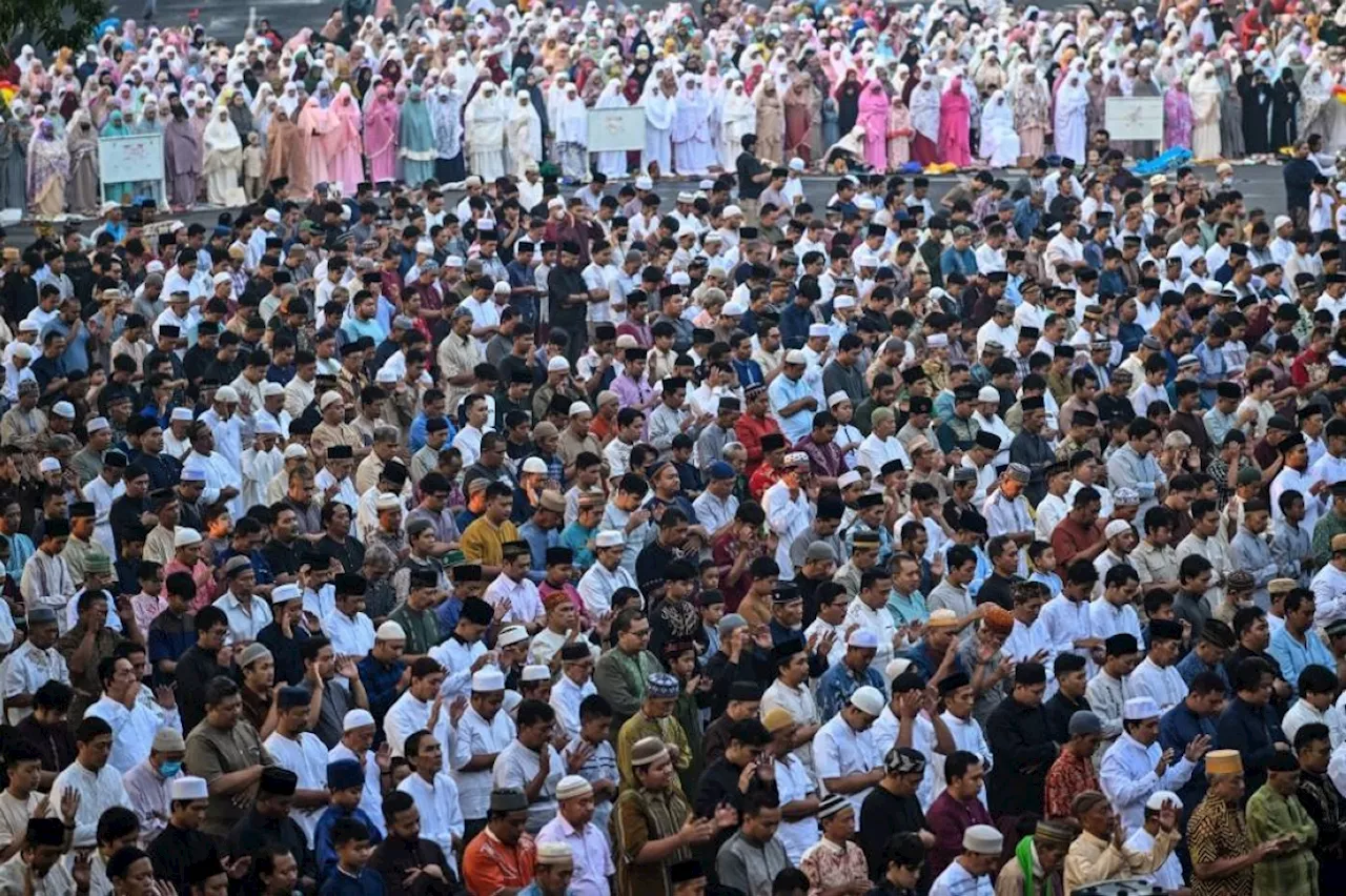 Muslims in Asia mark Eid al-Adha with sacrifices, feast