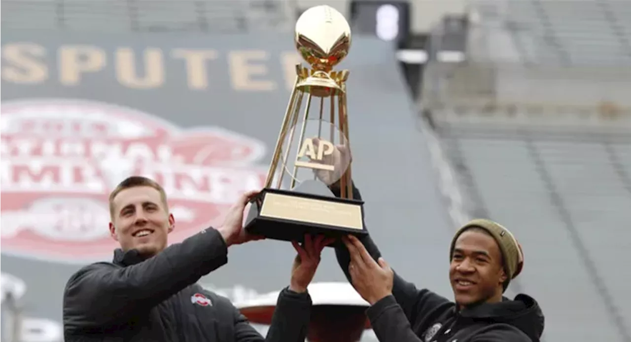 Michigan Uses Ohio State’s 2014 Associated Press Trophy in Its National Championship Wallpapers