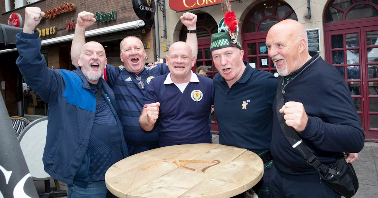 A little bit of rain won't stop the Tartan Army party in Cologne