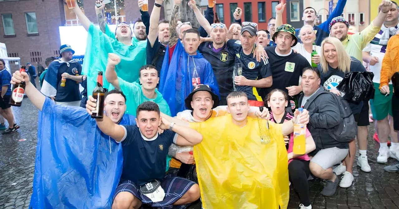 Scotland fans party in the rain taking over Cologne square ahead of Swiss game