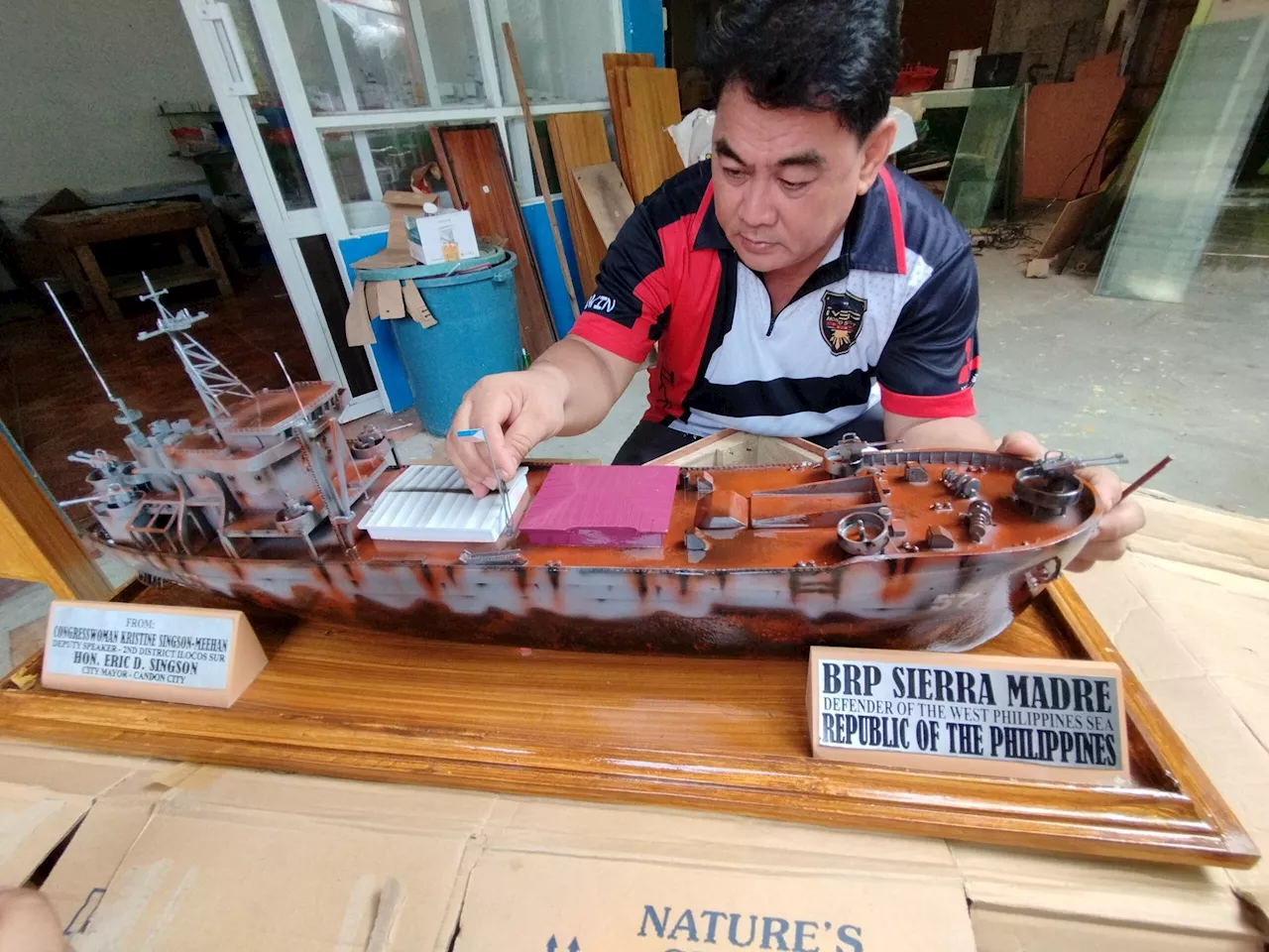 Retired seaman builds mini BRP Sierra Madre models, symbol West PH Sea struggles