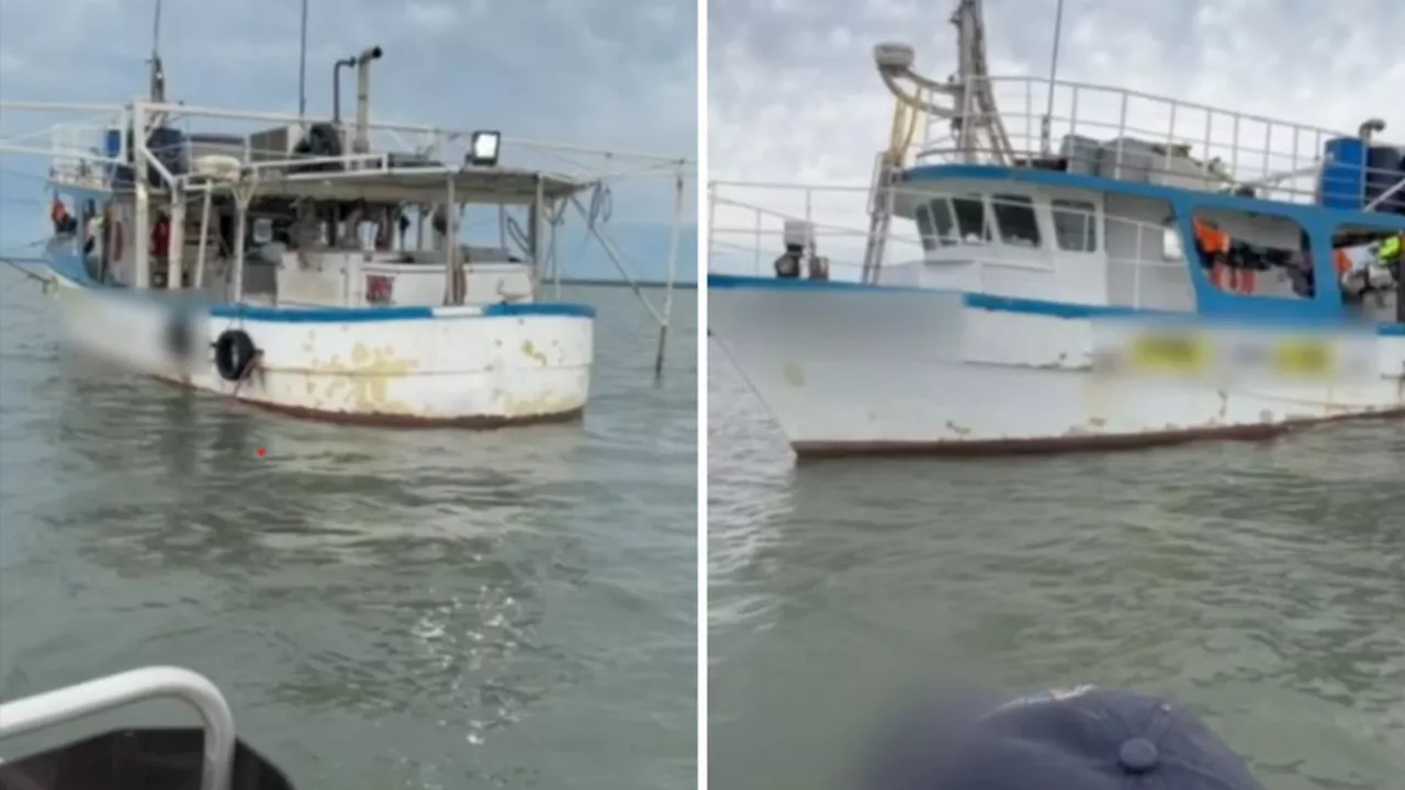 Workers allegedly held captive on boat off north Queensland coast by Darwin man