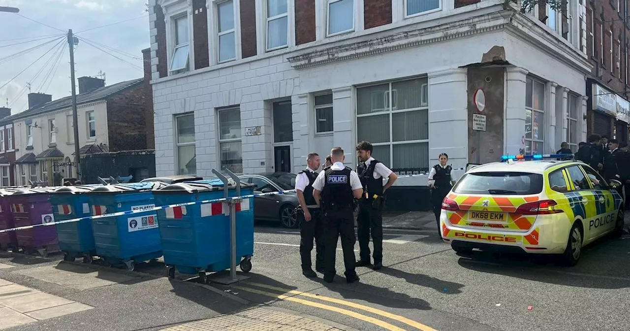 Street taped off after 'car reverses over man' outside Tesco