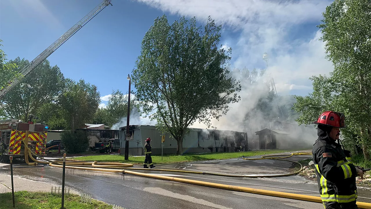 Two killed after plane crashes into Colorado mobile home park, setting two trailers ablaze