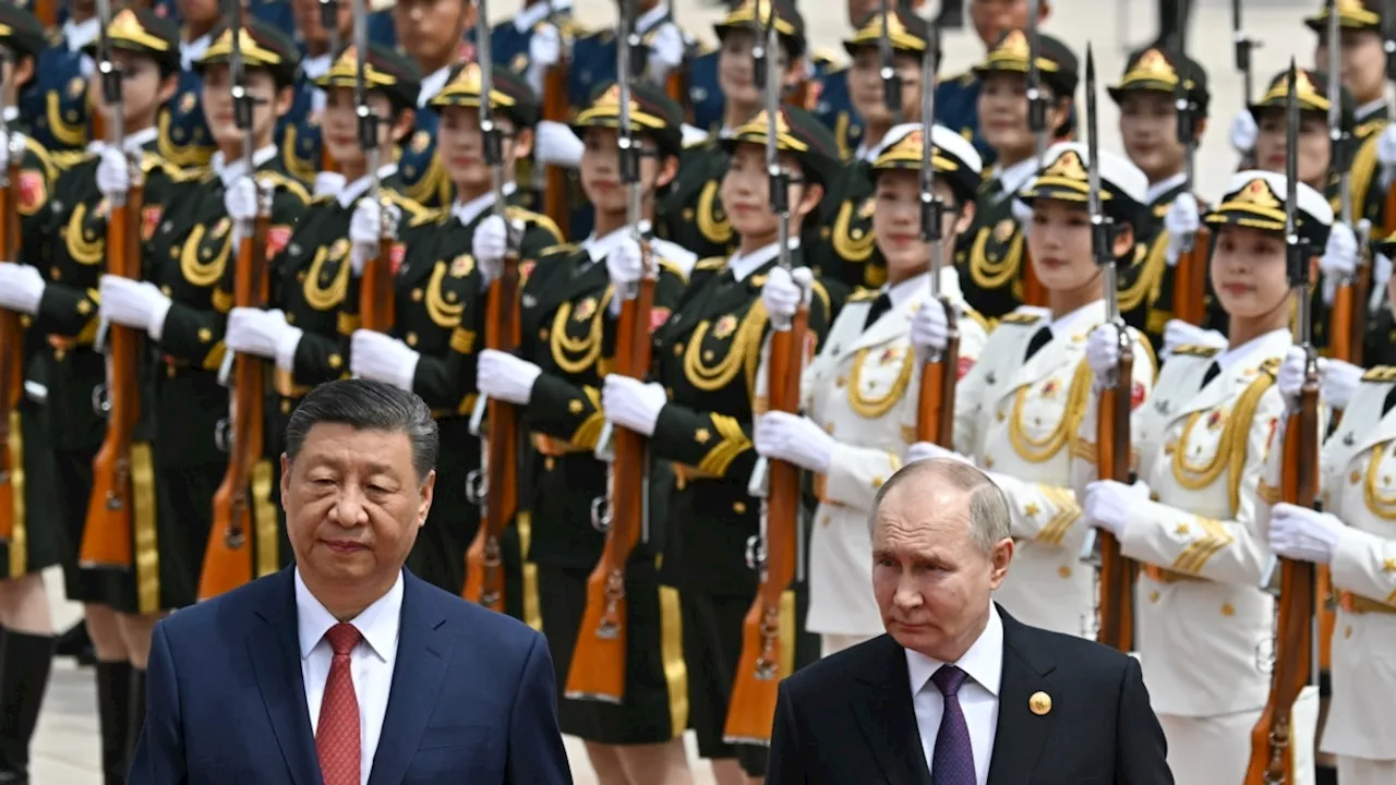 Putin claims Russia, China 'defend' democratic world order