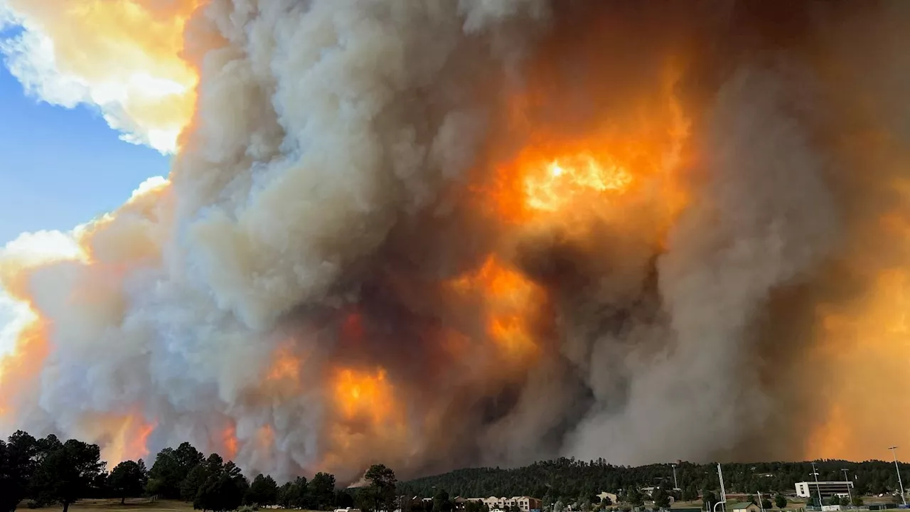 Thousands flee their homes due to wildfires as extreme heat grips parts of the US