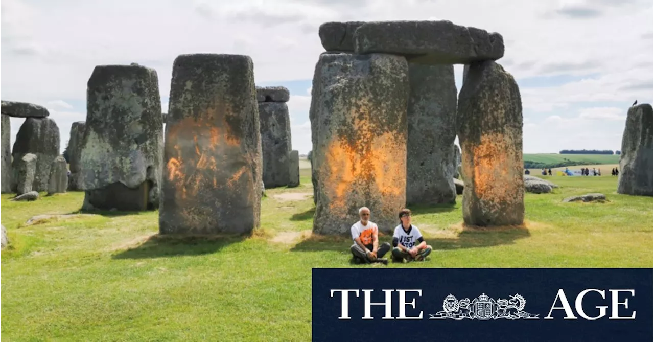 Stonehenge spray-painted orange in latest action by climate protesters