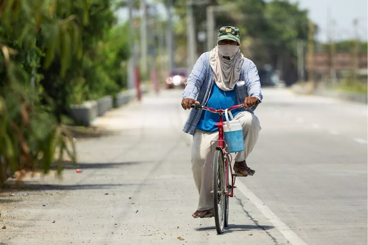 Explainer-How extreme heat threatens health and safety